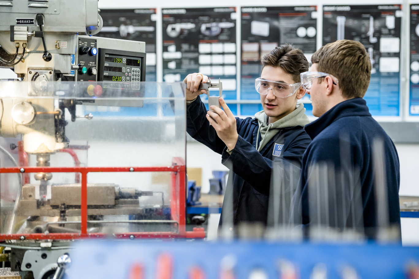 2 students in the engineering classroom