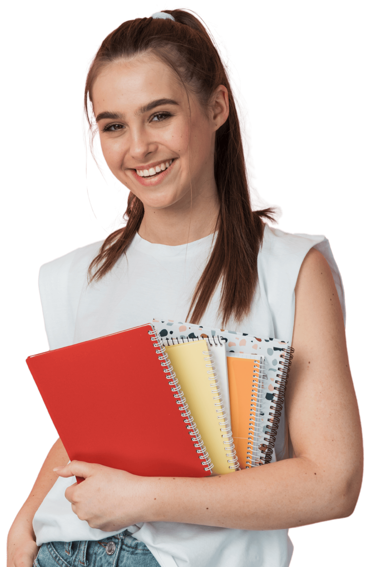 Girl smiling holding text books