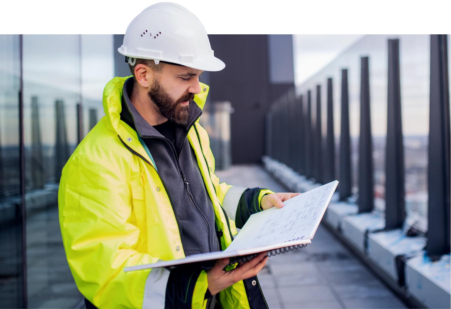 man construction manager looking at plans