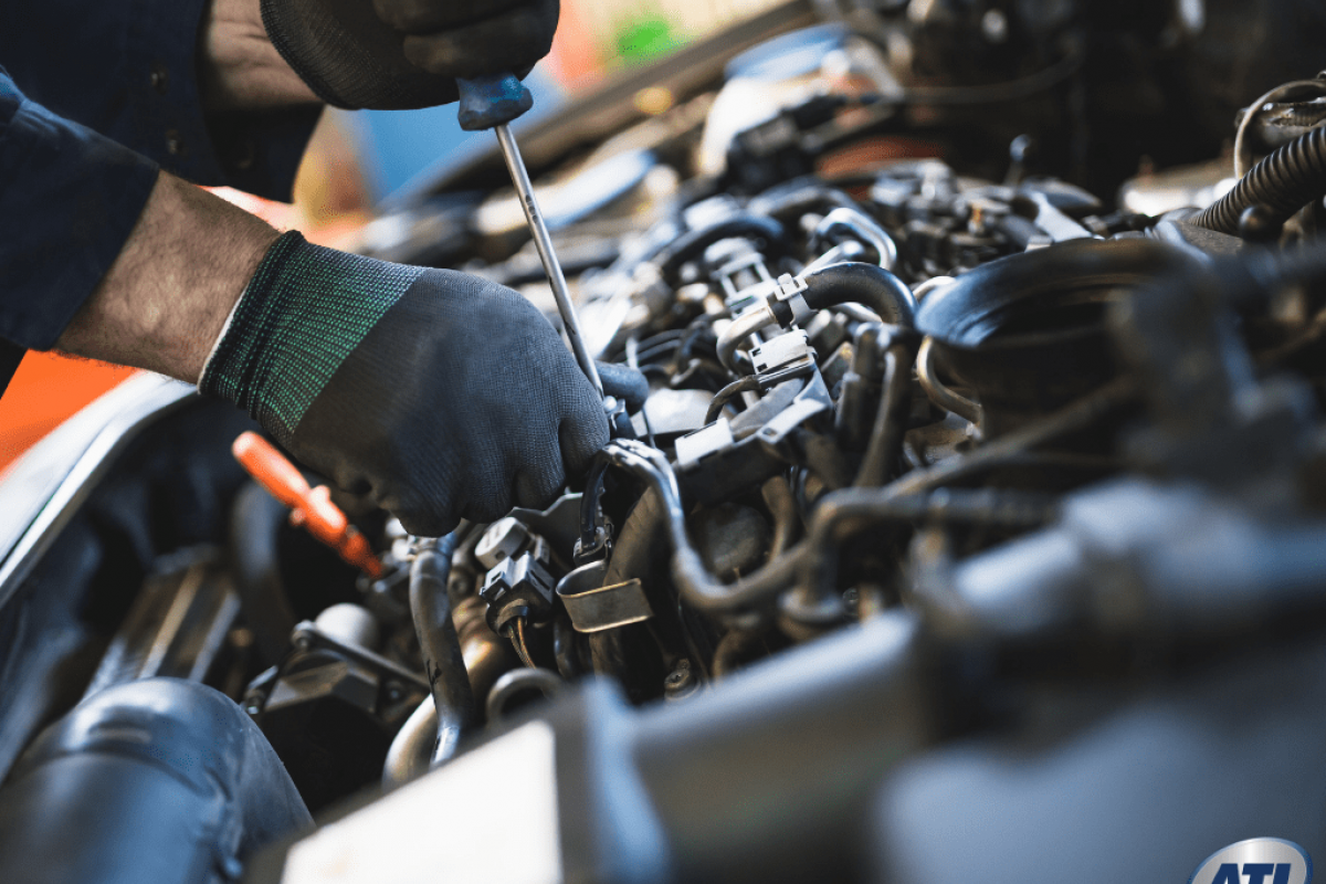 close up of mechanic hands working