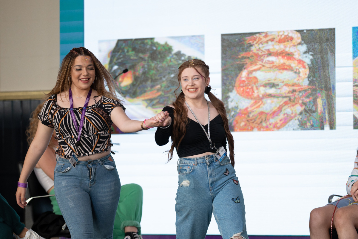 students preforming on stage at the faculty of service industries and education awards 