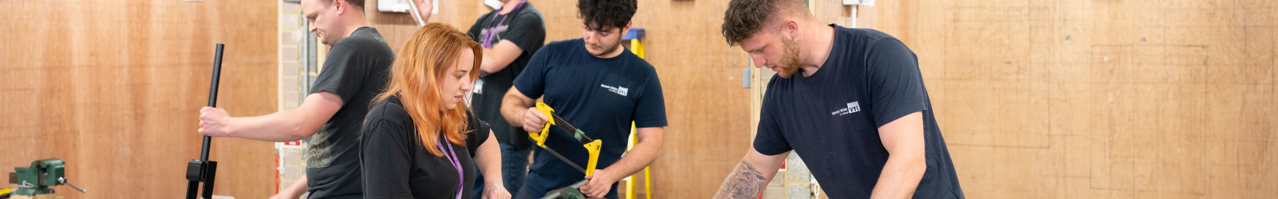 Electrical students working in workshop