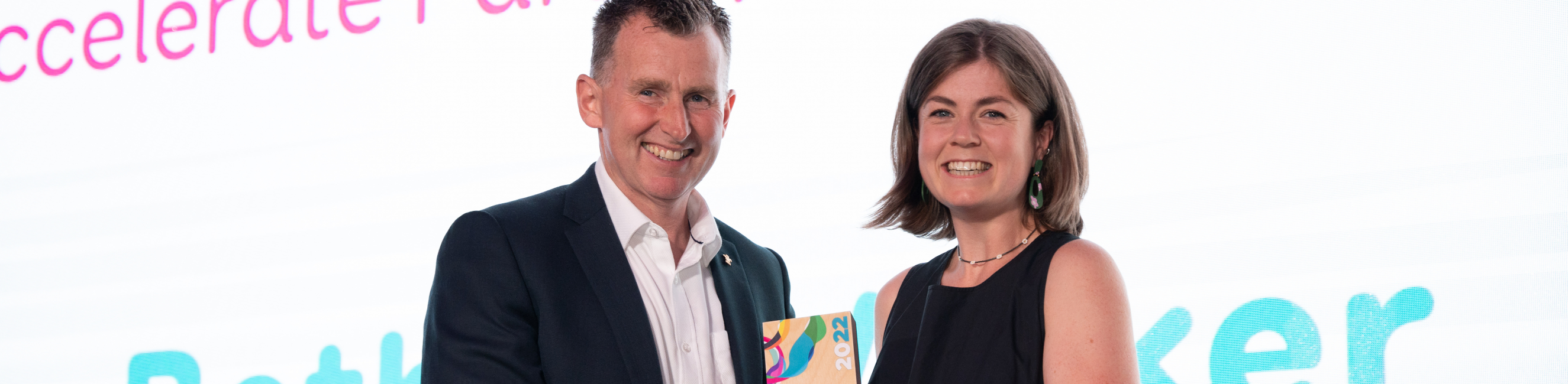 Bethan Walker receiving award at Business Awards