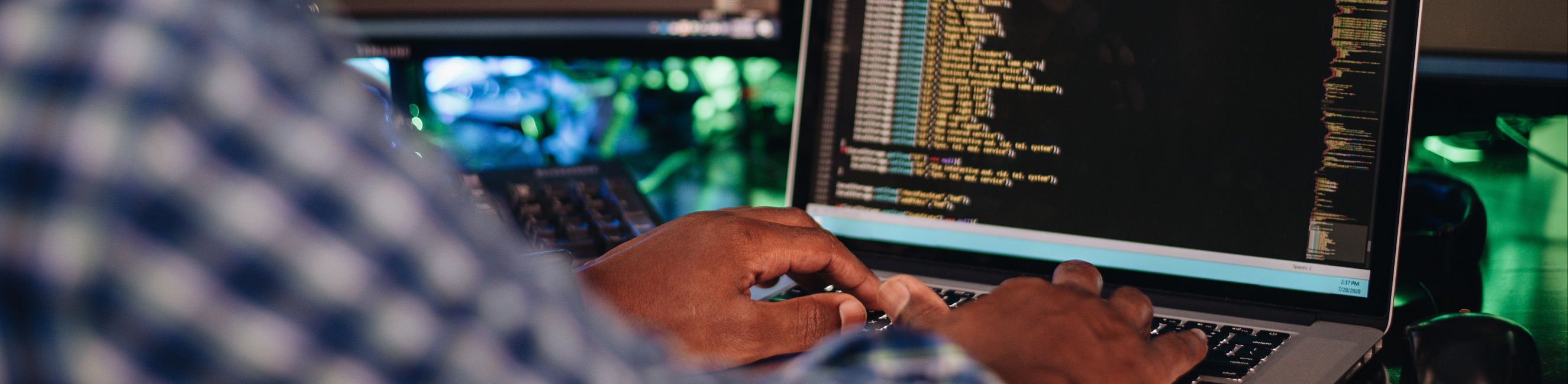 software engineer typing on computer