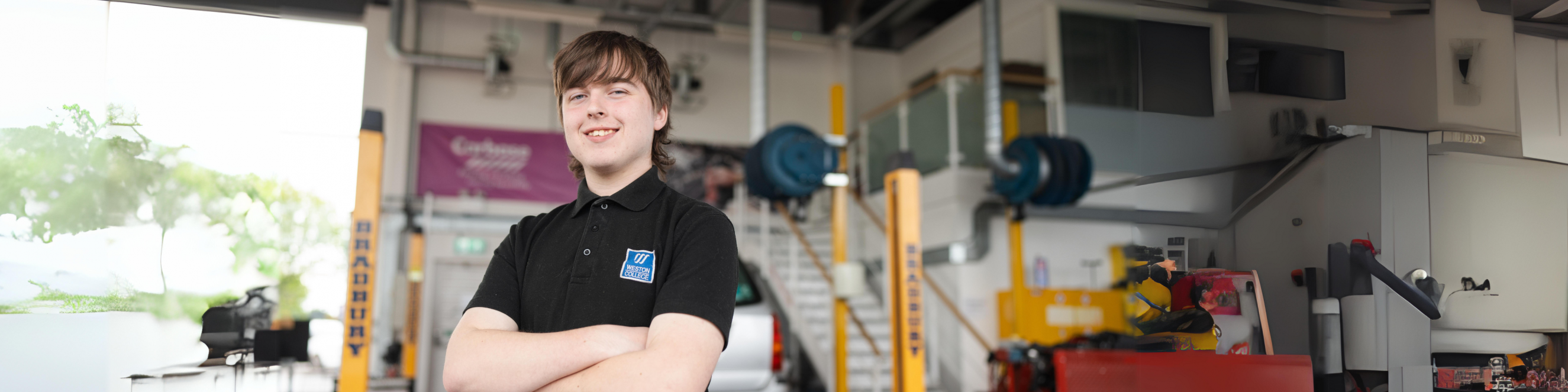 student in car garage