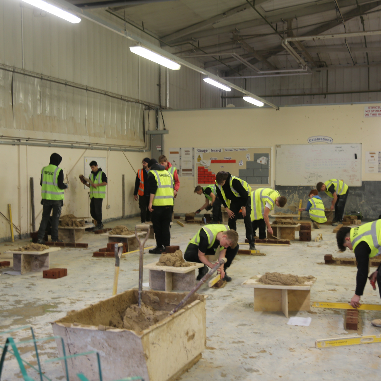 Students practicing bricklaying in the South West Skills brickwork workshop