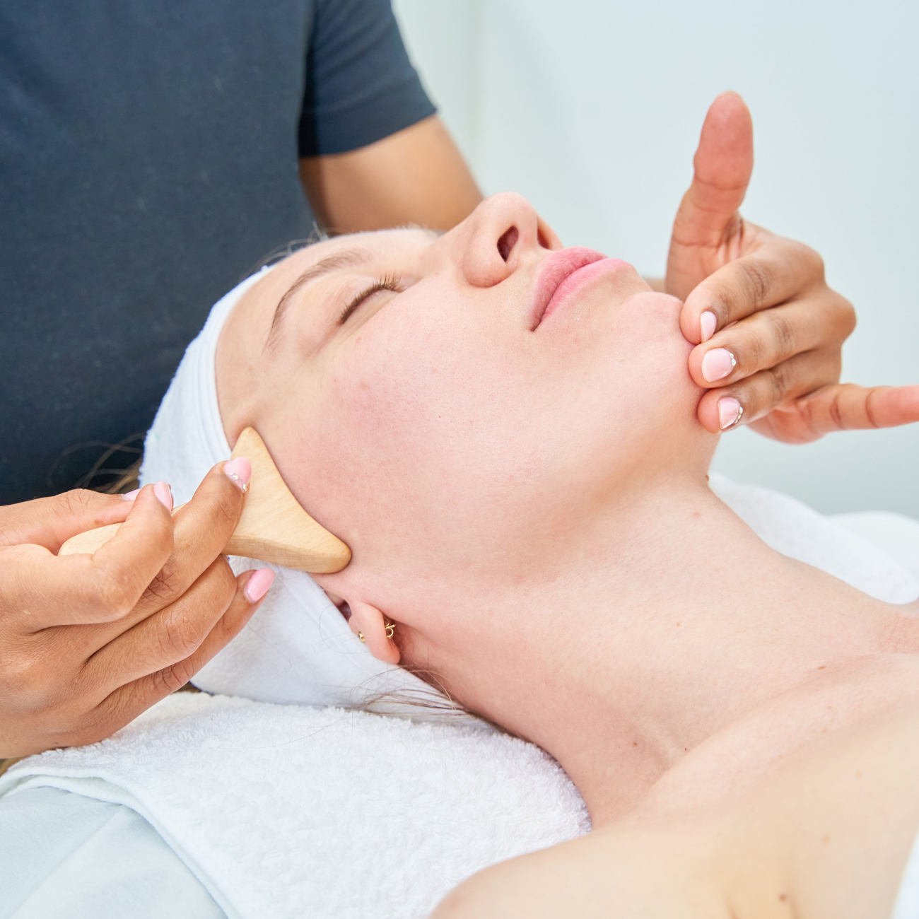Woman receiving a facial