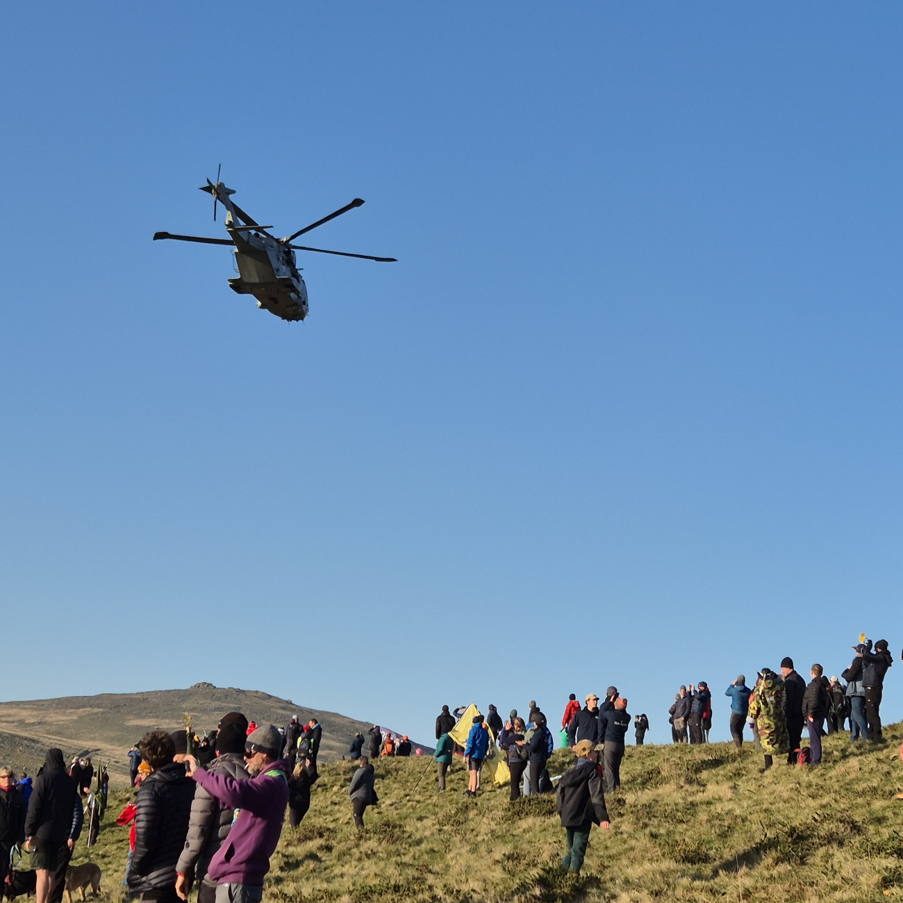 Helicopter flying through the sky