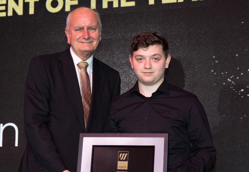 Benjamin with award