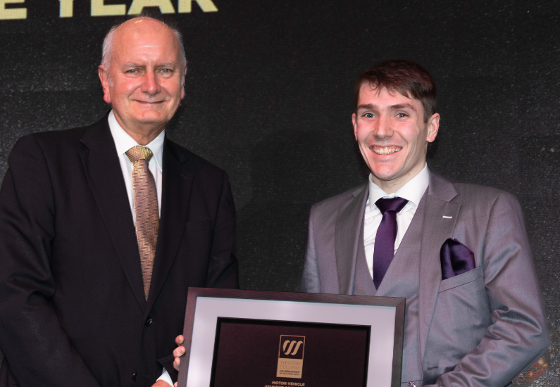 Robert with award
