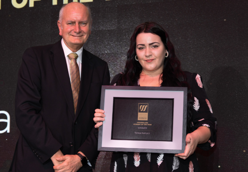 Teresa with award