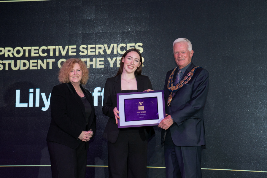 Lily collecting award